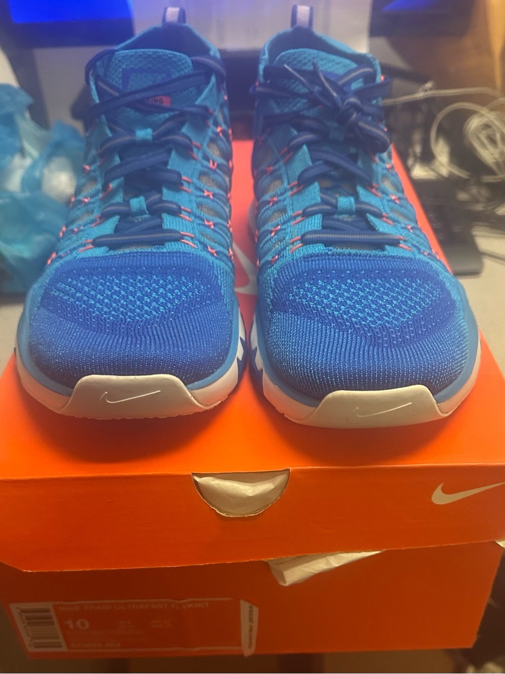 Nike Train Ultrafast Flyknit blue and orange training shoe size 10
•
